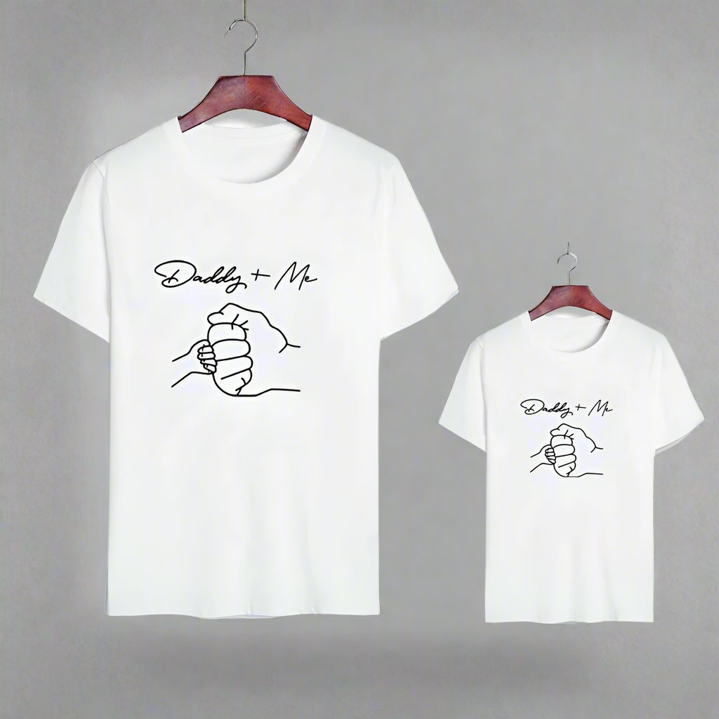 Daddy and Me matching T-shirts, black shirt with hand-hold outline graphic for father and child