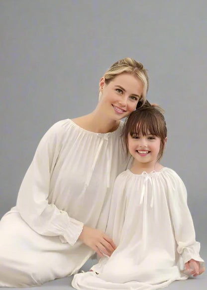 Mother-daughter white nightgown set with gathered neckline and flowy design