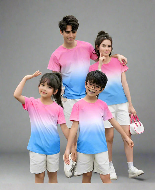 Family wearing matching pink to blue ombre t-shirts