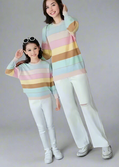 Family matching pastel striped cardigan and sweater set in soft colors