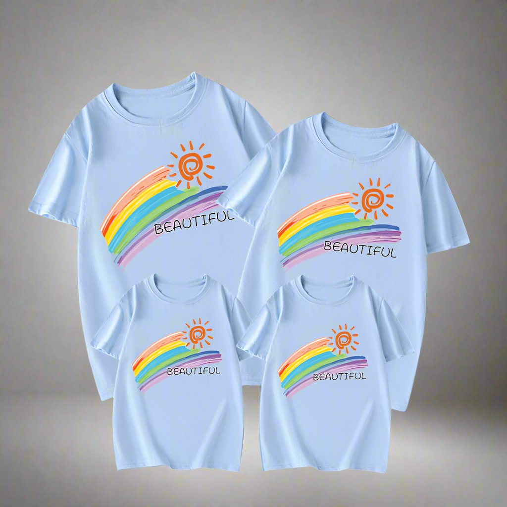 Rainbow family shirts with 'Beautiful' message, perfect for joyful family gathering