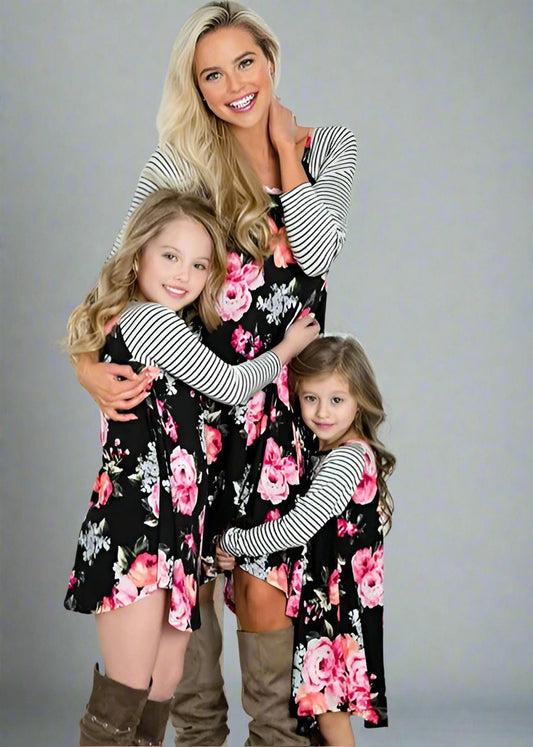 Family matching floral dresses with striped sleeves for mom and daughters, great for any casual occasion