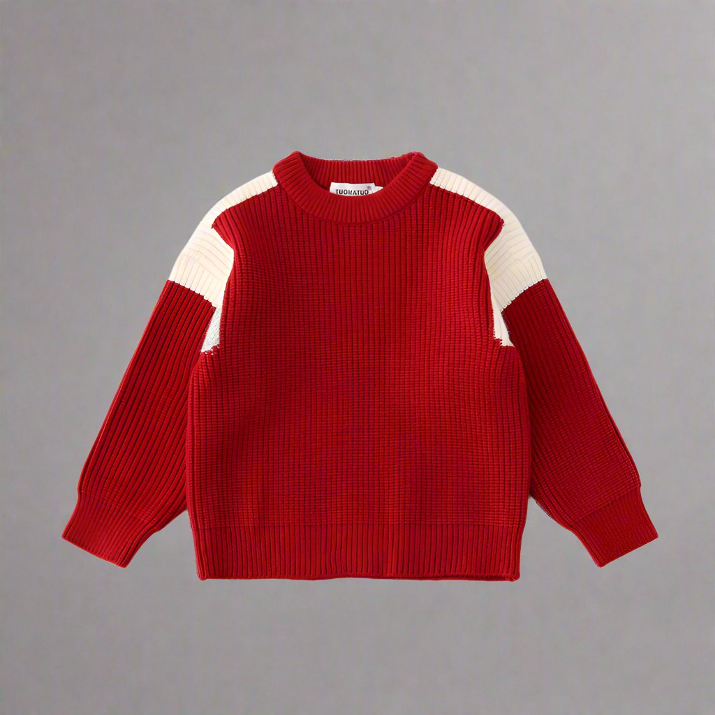 Cozy family outfit featuring matching red and white knit sweaters styled with casual denim