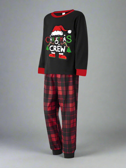 Family Christmas pajamas featuring Christmas Crew design, black tops, and plaid pants