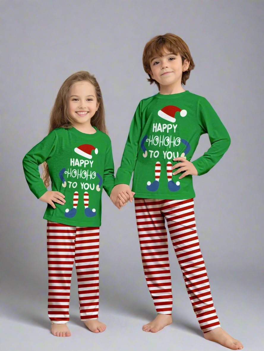 Green and red matching family Christmas pajamas with elf design and holiday chee