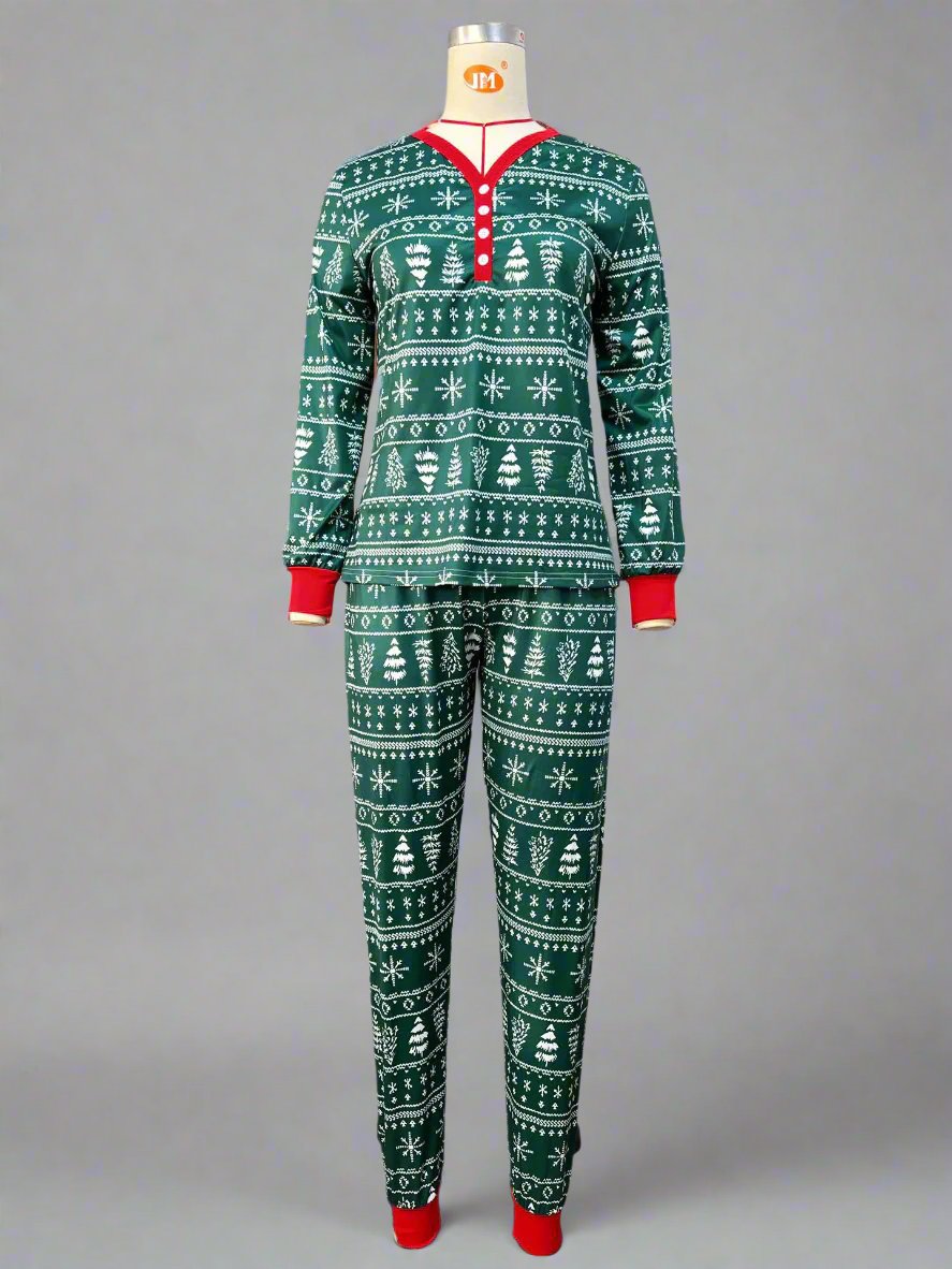 Matching family Christmas pajamas in green with red accents, fair isle pattern