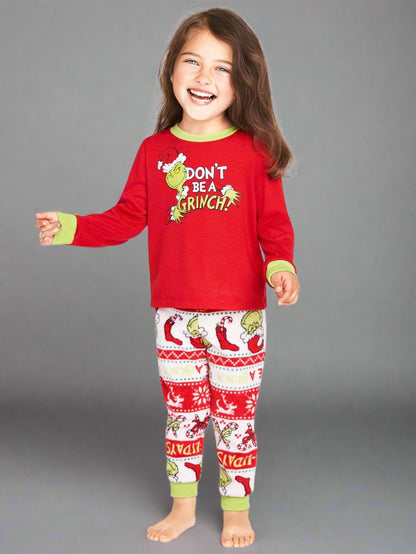 Family Christmas pajamas with Grinch design, 'Don't Be a Grinch' text, and festive patterns