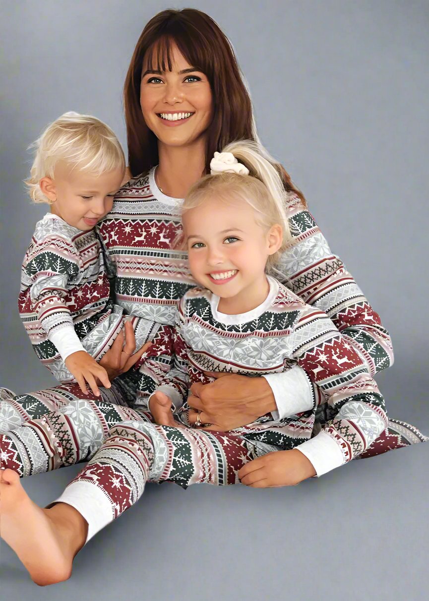 Christmas family pajamas in red, green, and white with reindeer fair isle pattern