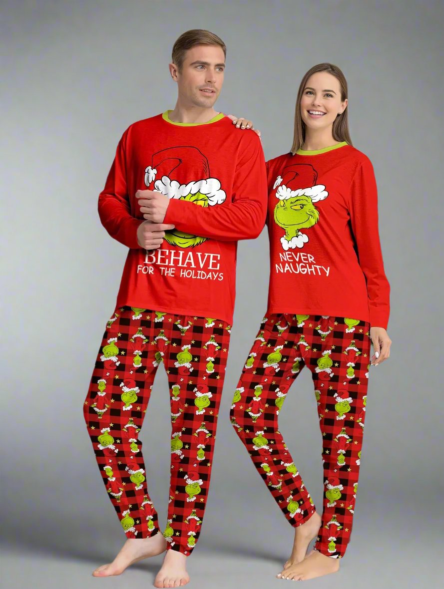 Matching Grinch-themed family pajamas for Christmas, with red tops and holiday plaid pants