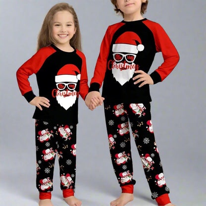 Family holiday pajamas set with cool Santa Claus in sunglasses