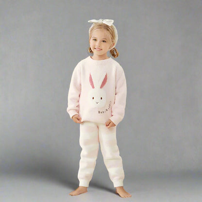 Adorable pink pajamas with a fluffy bunny design, perfect for parents and kids