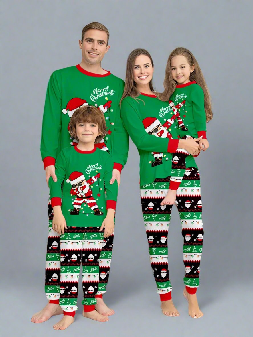 Matching family Christmas pajamas featuring a dabbing Santa print and festive holiday patterns