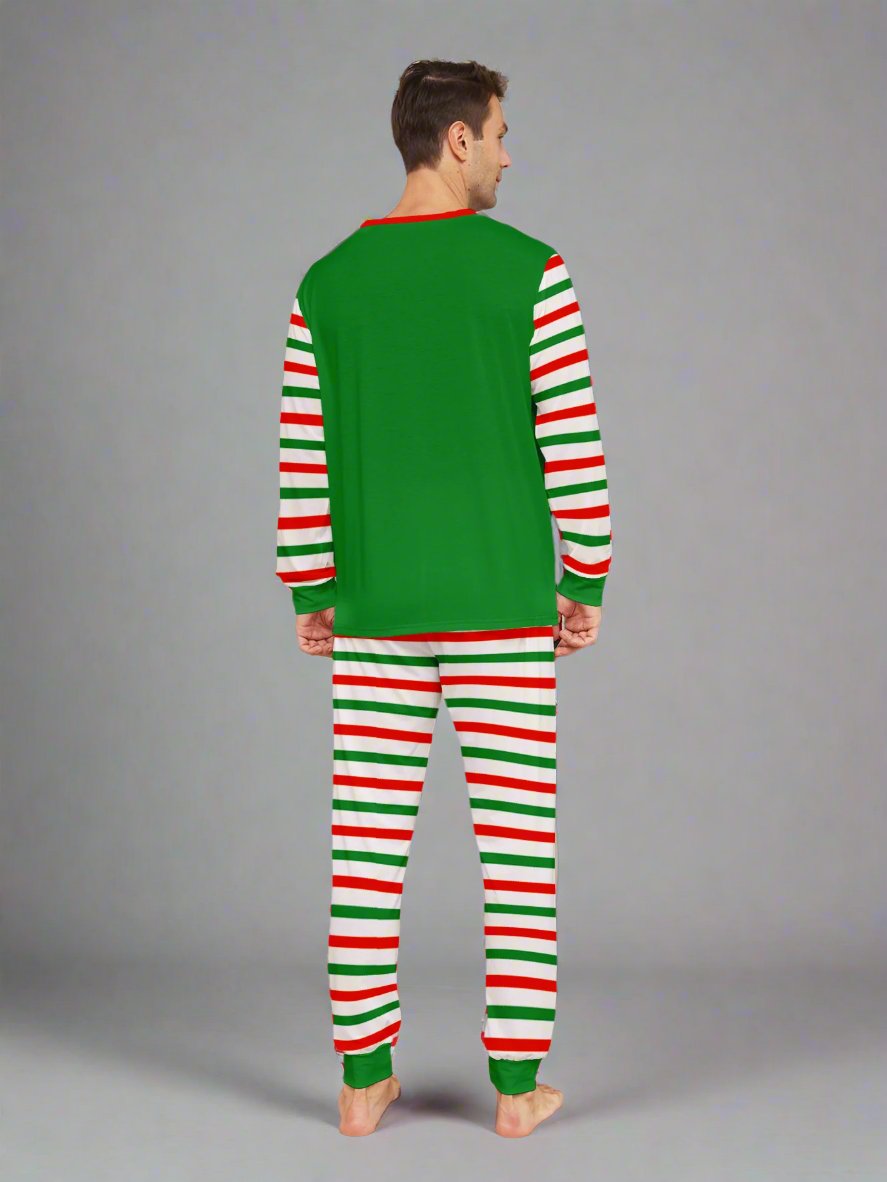 Family wearing matching elf costume Christmas pajamas with red and green candy cane stripes