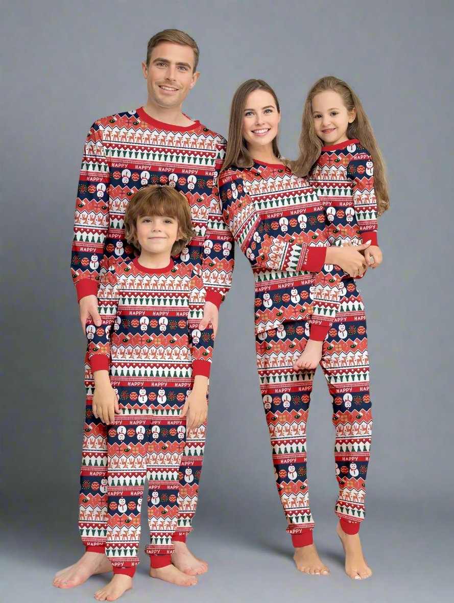 Family in matching Christmas pajamas with Santa, reindeer, snowflakes, and 'Happy' pattern