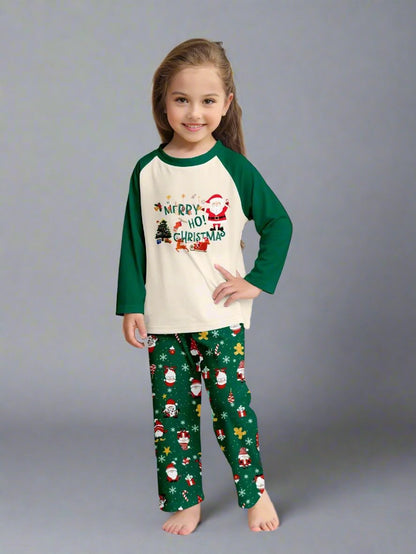 Cozy family matching pajamas set with Santa Claus design and festive green holiday pattern