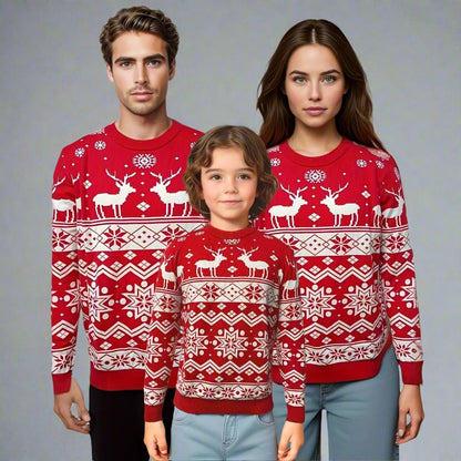 Family wearing matching red Christmas sweaters with reindeer and snowflake patterns, perfect for festive gatherings