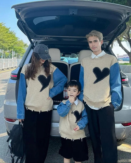 Family matching outfits with beige sweaters, denim sleeves, and black heart designs for a trendy fall fashion look