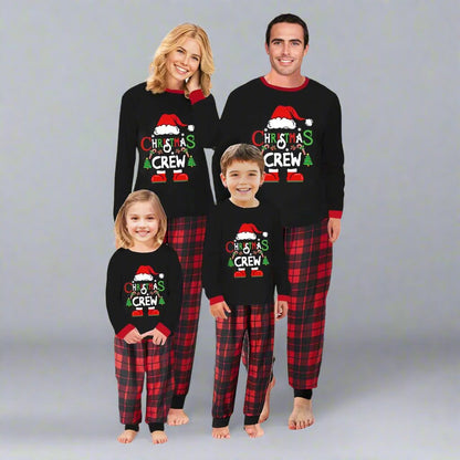 Matching family Christmas Crew pajamas with Santa hat design and red plaid pants