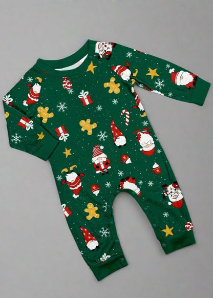 Parents and children in matching Christmas pajamas with Santa Claus design and green holiday prints