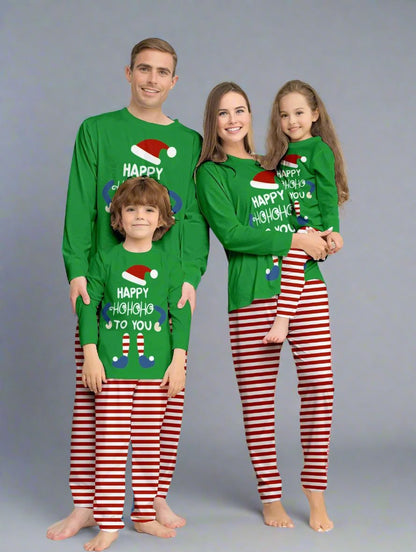 Matching family Christmas pajamas with green elf theme and 'Happy Ho Ho Ho' tex