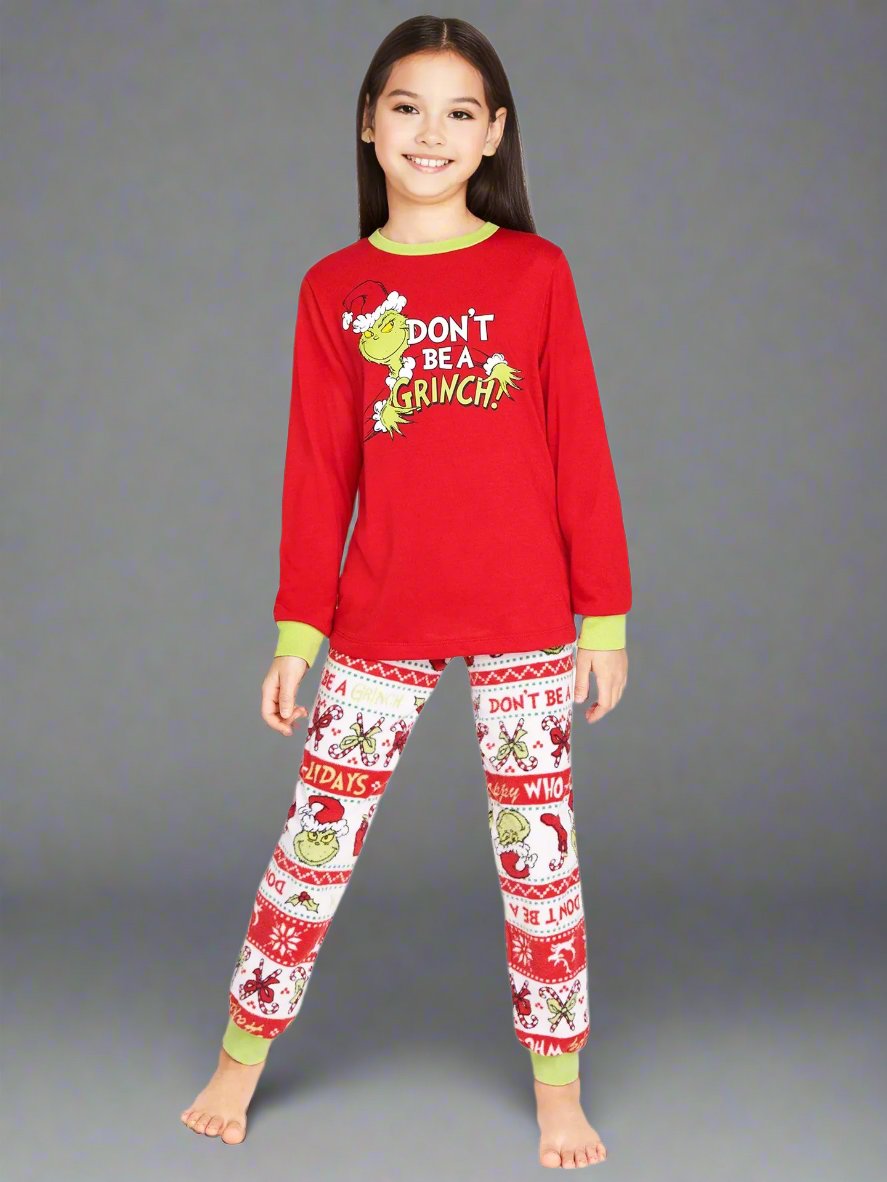 Holiday family pajamas set featuring Grinch-themed 'Don't Be a Grinch' message in red and green