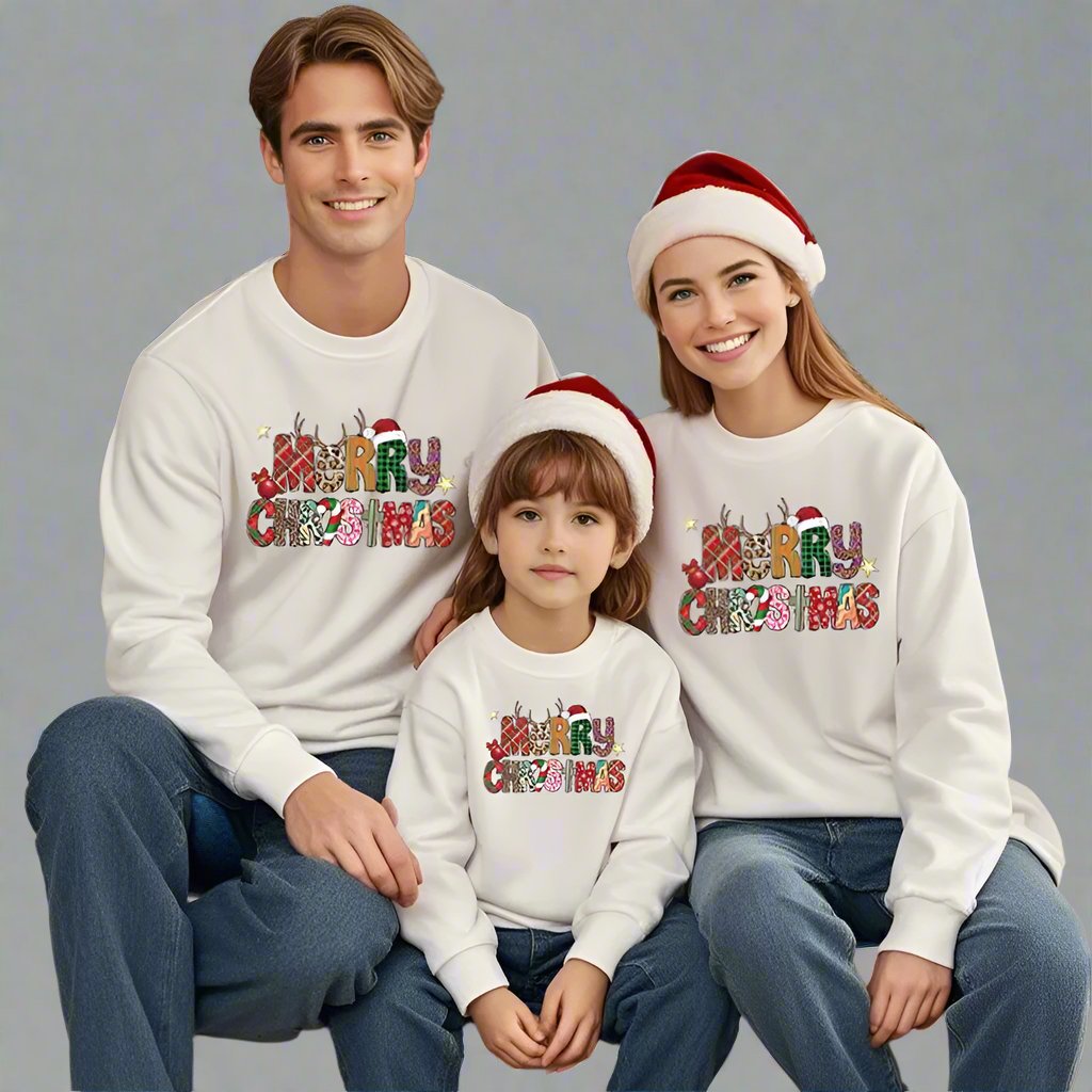 Family in Christmas-themed sweatshirts with 'Merry Christmas' text, perfect for holiday photos