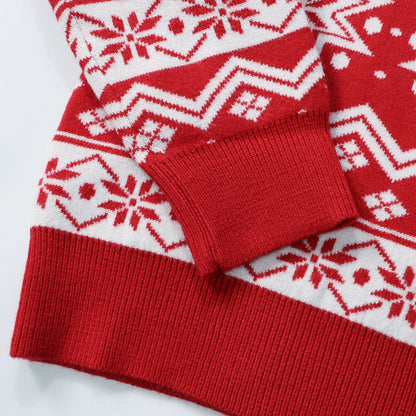 Festive family outfit idea with matching red Christmas sweaters for parents and children