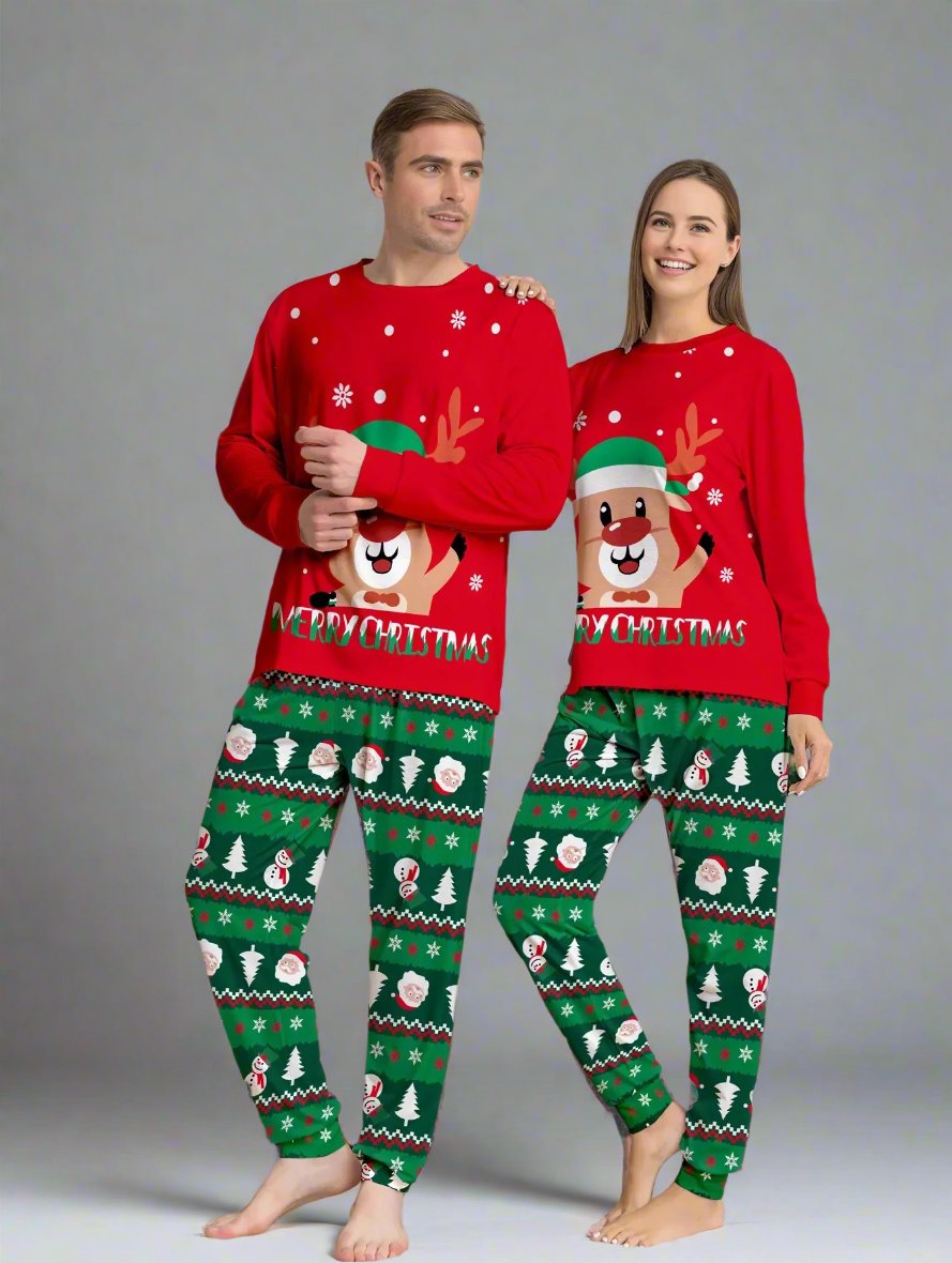 Parents and kids dressed in festive matching Christmas pajamas with cute reindeer and snowflake patterns