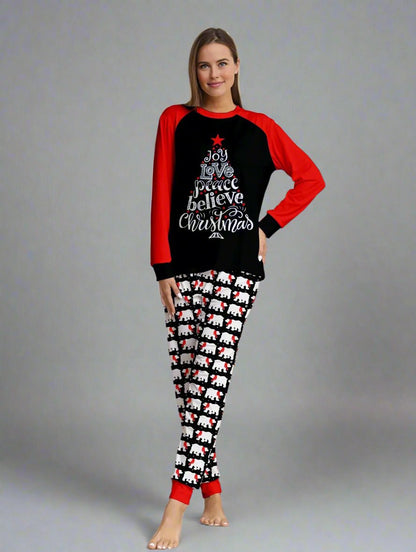 Matching Christmas pajamas for families with inspirational holiday message and festive red accents