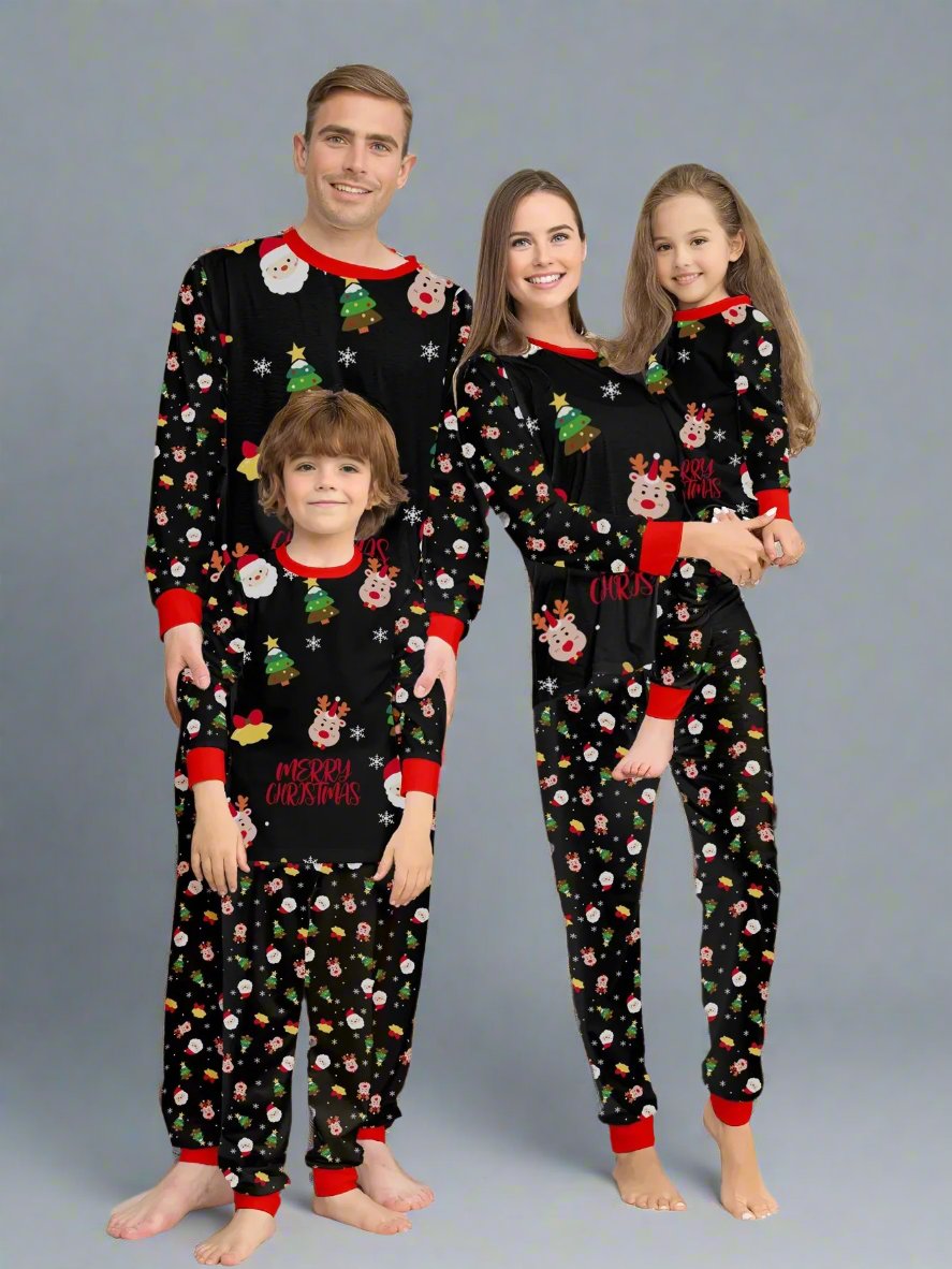 Family in matching Christmas pajamas with Santa, reindeer, and holiday tree prints in red, white, and black