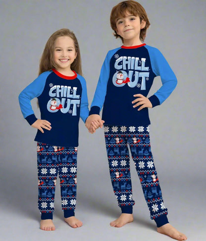 Matching family Christmas pajamas with 'Chill Out' message, snowman print, and blue snowflake pants