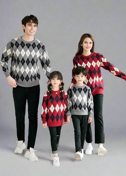 Family of four wearing matching argyle sweaters in red and grey, perfect for coordinated family outfits