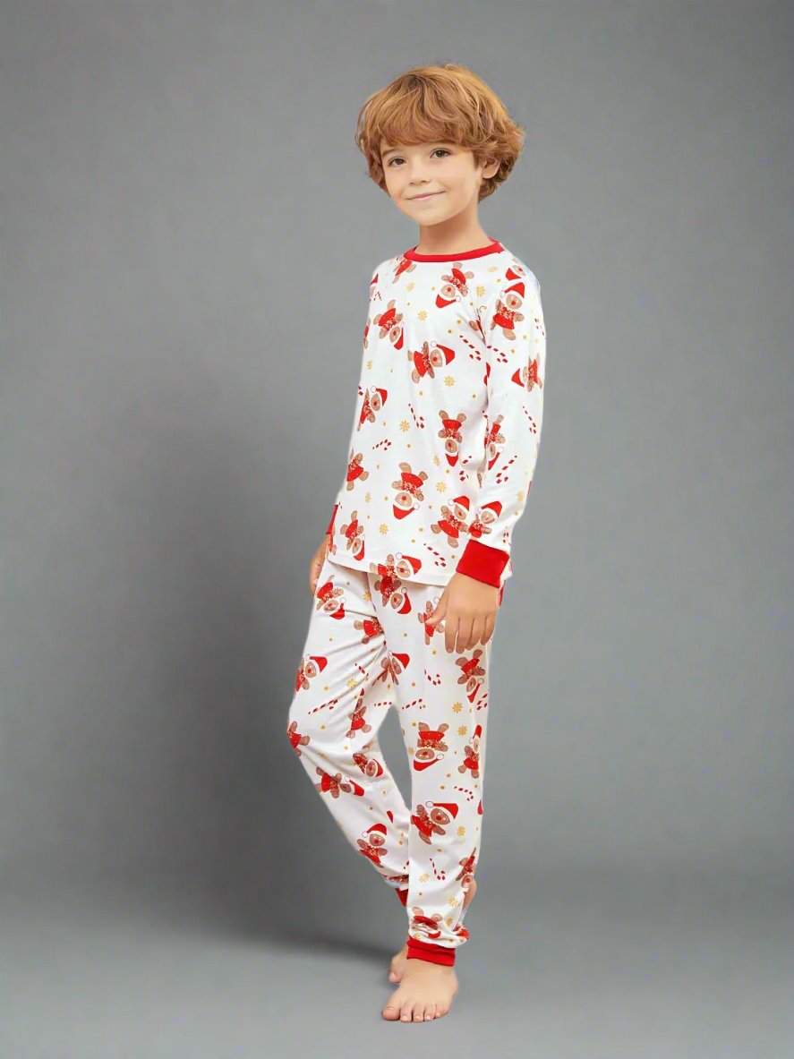 White family Christmas pajamas with red accents and playful Santa and reindeer print