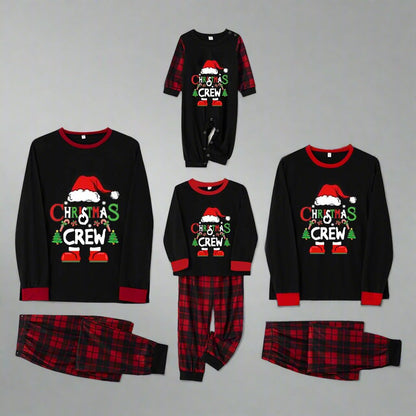 Matching family pajamas in black and red plaid with Christmas Crew and Santa hat print