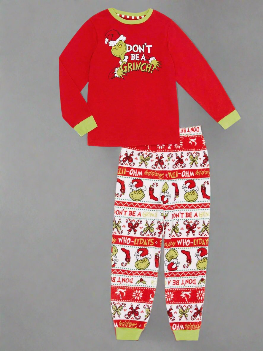 Matching family pajamas in red and green with Grinch character and holiday message