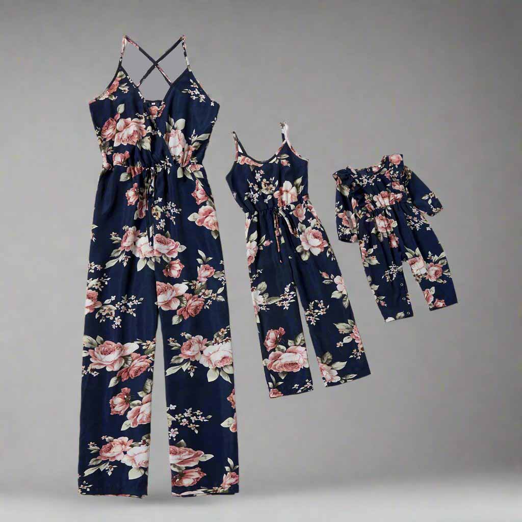 Matching navy floral jumpsuits for mom, daughter, and baby, perfect for summer outings