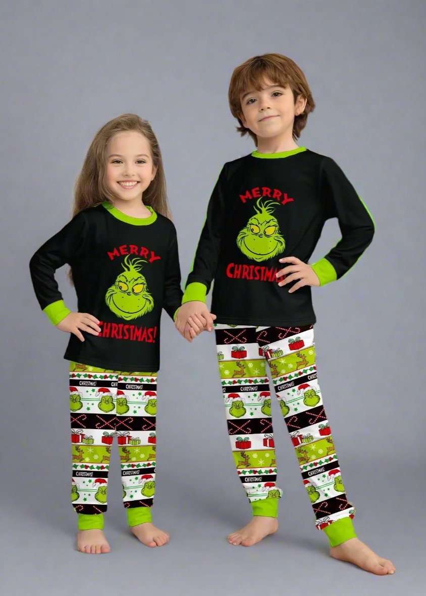 Grinch-themed holiday pajamas for families, featuring 'Merry Christmas' text and colorful design