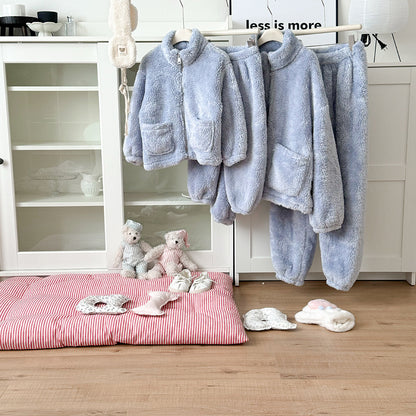 Family matching fuzzy loungewear sets in pastel colors, featuring zip-up jackets and cozy pants for mom and kids