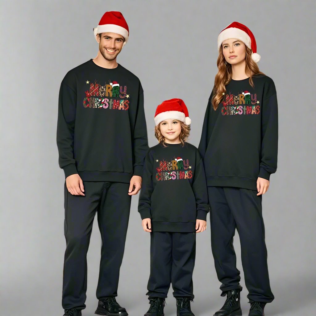 Family wearing matching Merry Christmas sweatshirts with Santa hats for holiday