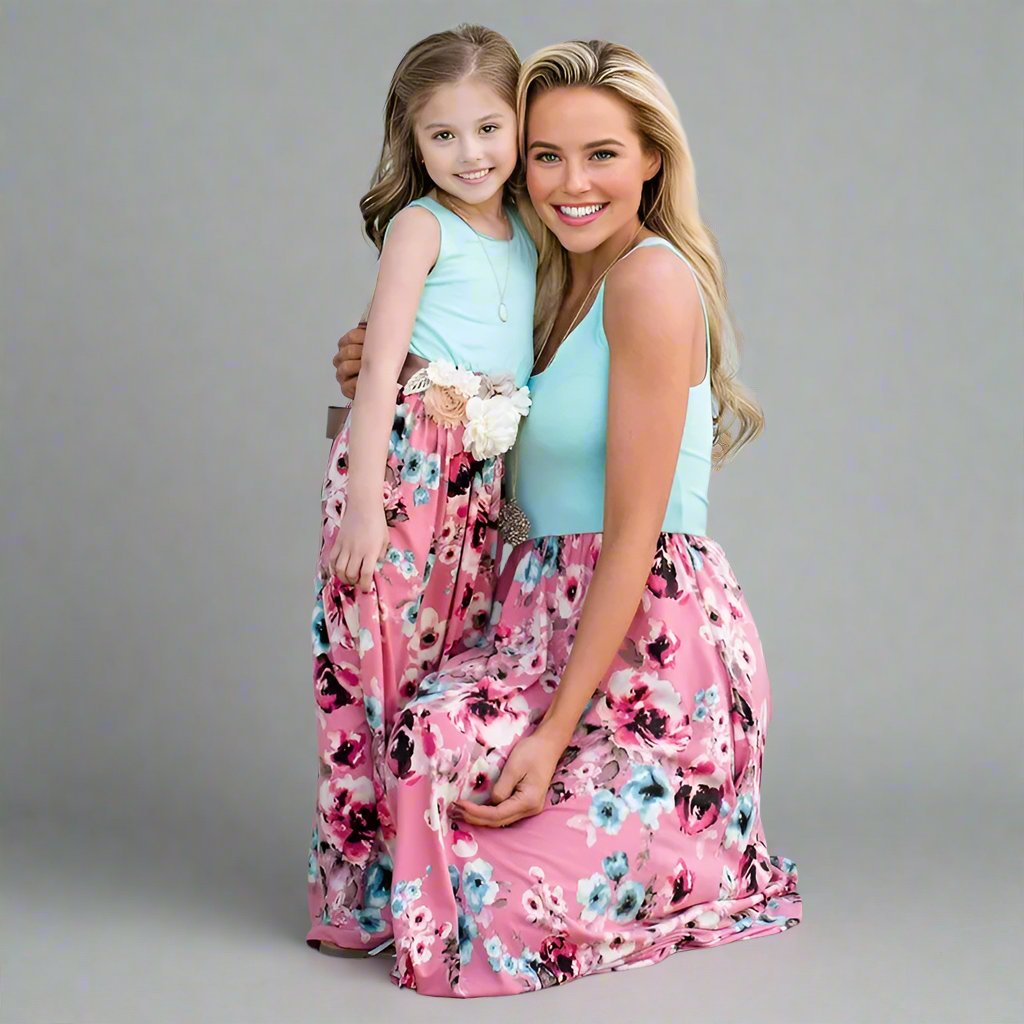 Mom and daughter in matching pink floral maxi dresses