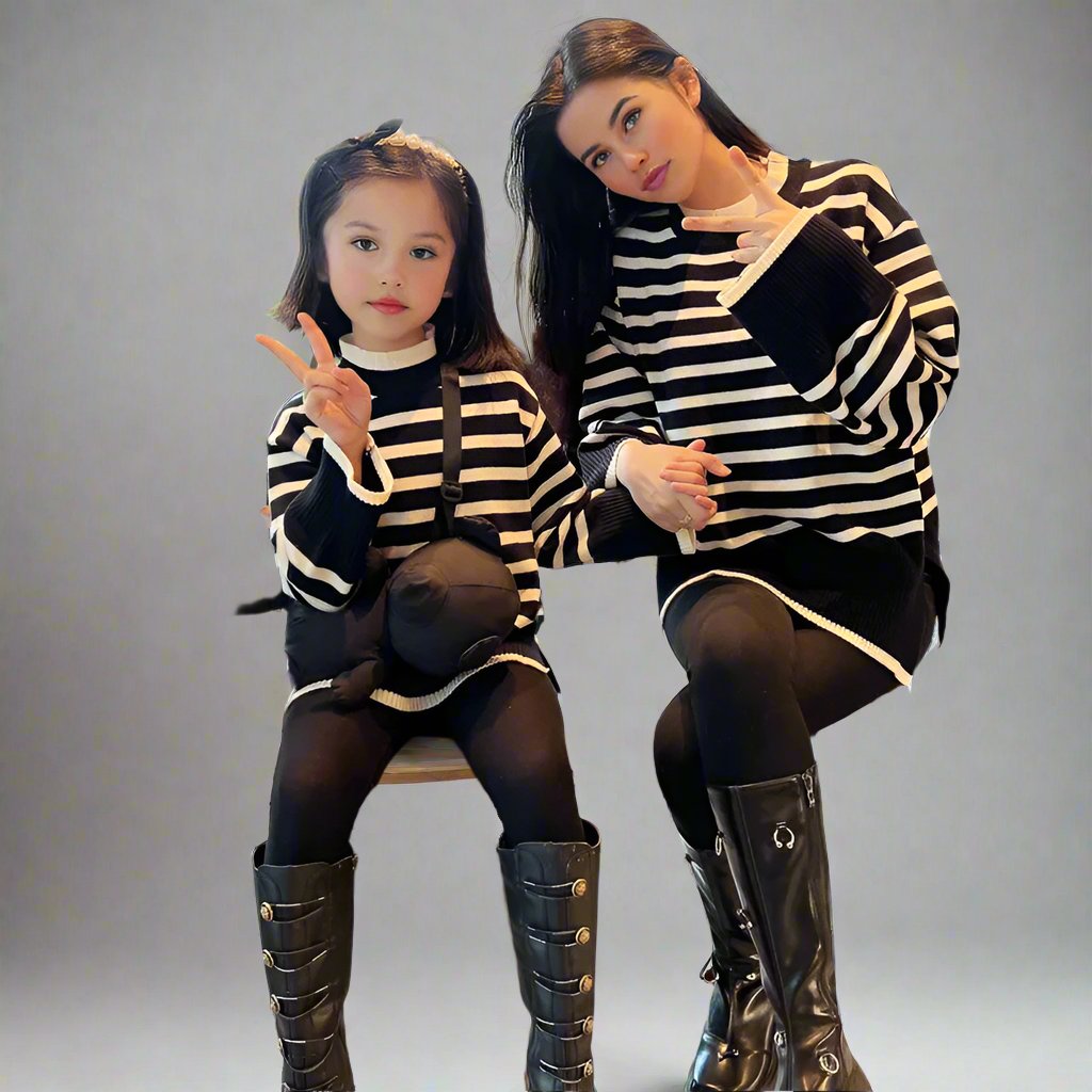 Family matching outfits with black and white striped sweaters