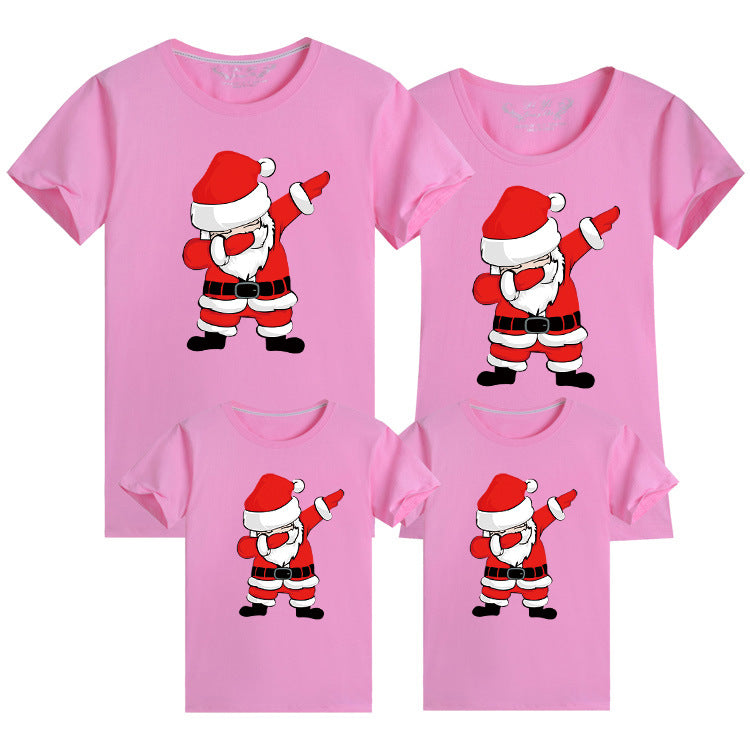 Fun pink Christmas family shirts featuring dabbing Santa design