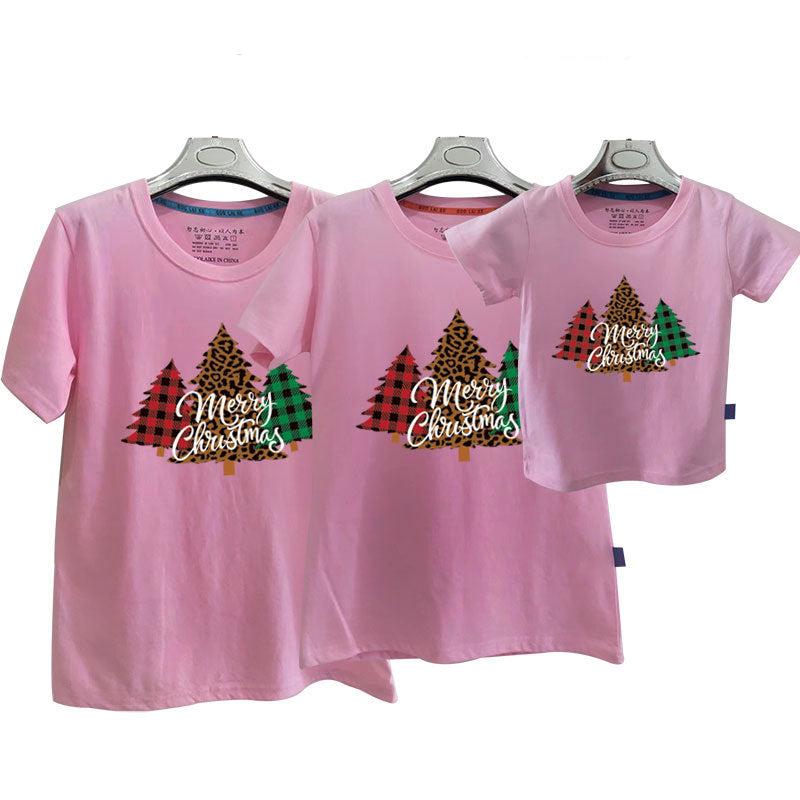 Pink matching family Christmas t-shirts with leopard and plaid Christmas trees and festive 'Merry Christmas' lettering