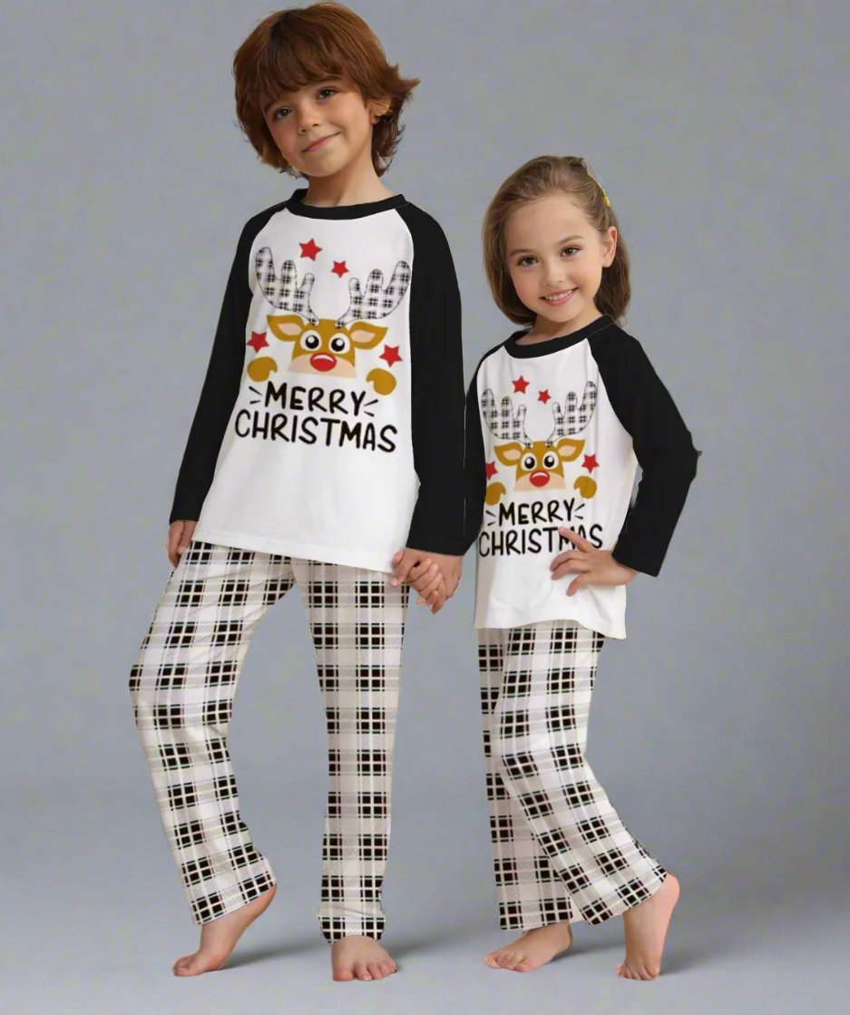 Festive family Christmas pajamas with reindeer and plaid pattern, perfect for holiday photos