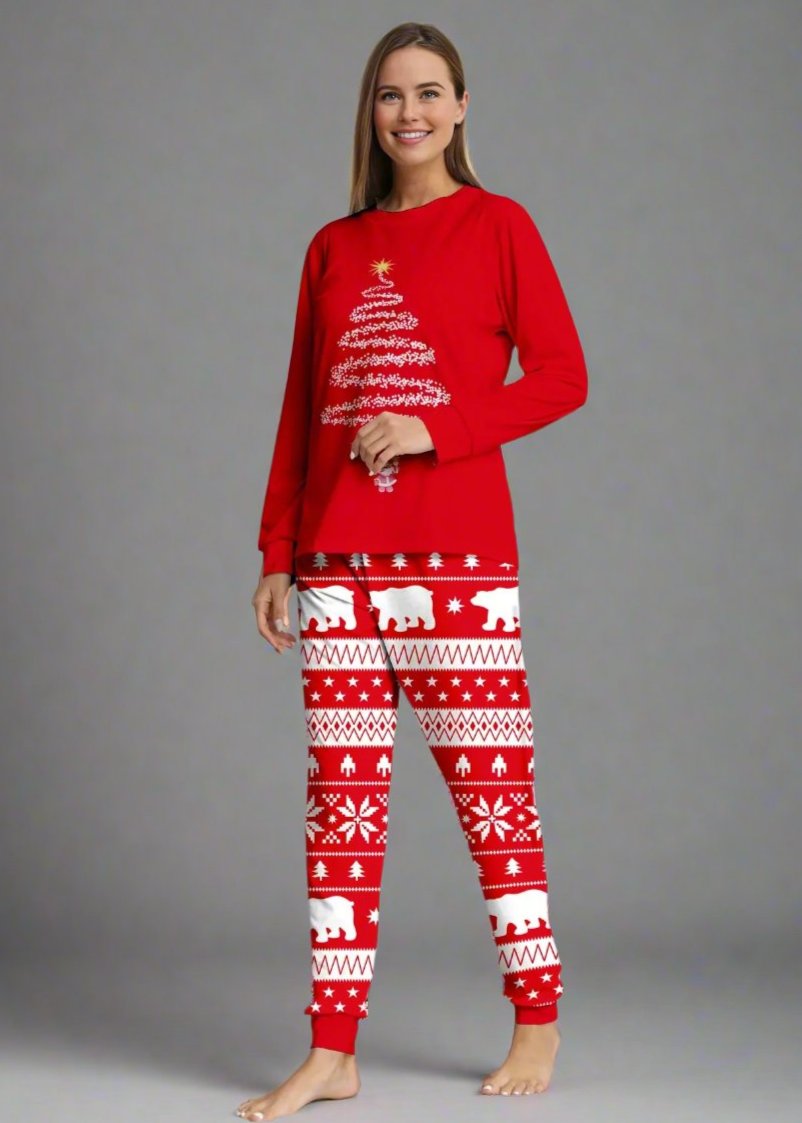 Matching family pajamas in red with festive Christmas tree top and fair isle print pants