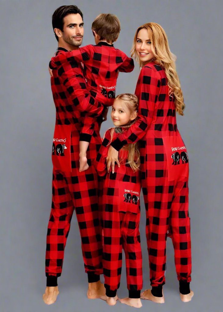 Matching family Christmas pajamas in red and black plaid pattern