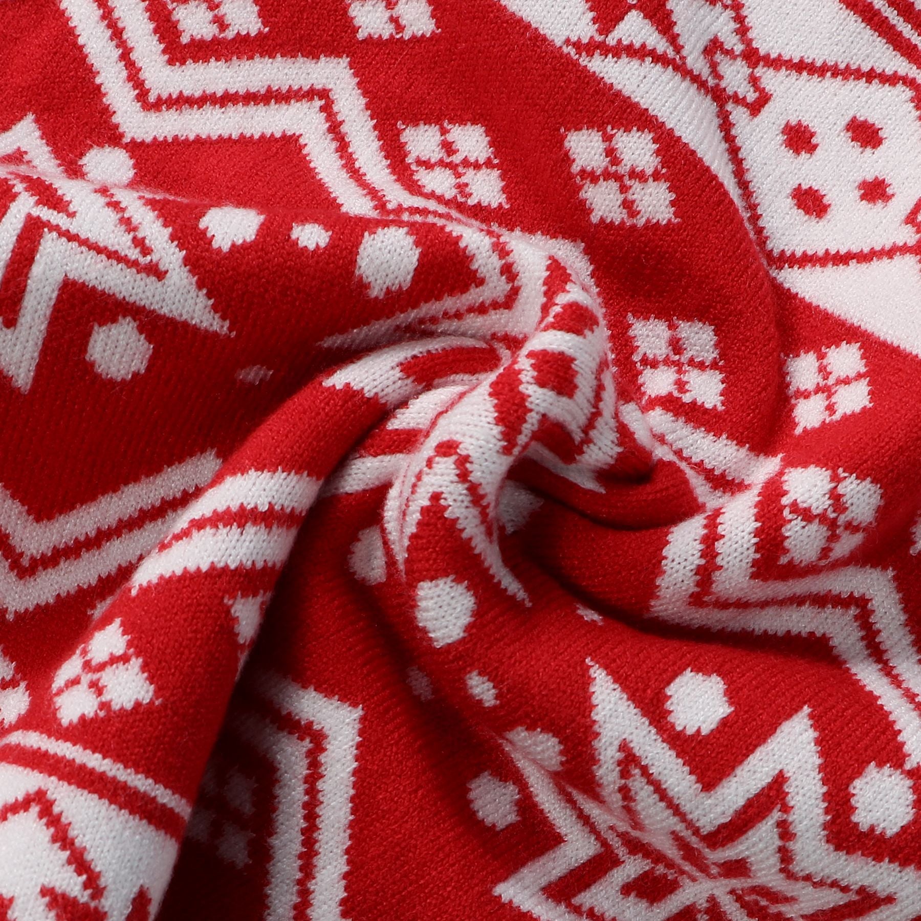 Cozy red family sweaters with reindeer and snowflake details, ideal for winter holidays