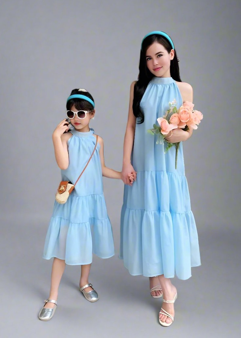 Family matching outfit set: mother and daughter wearing light blue dresses