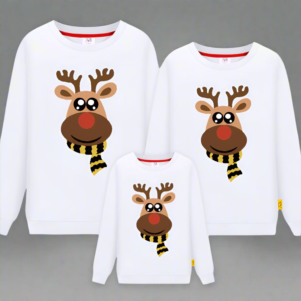 White family Christmas sweaters with a cheerful reindeer and red nose holiday design