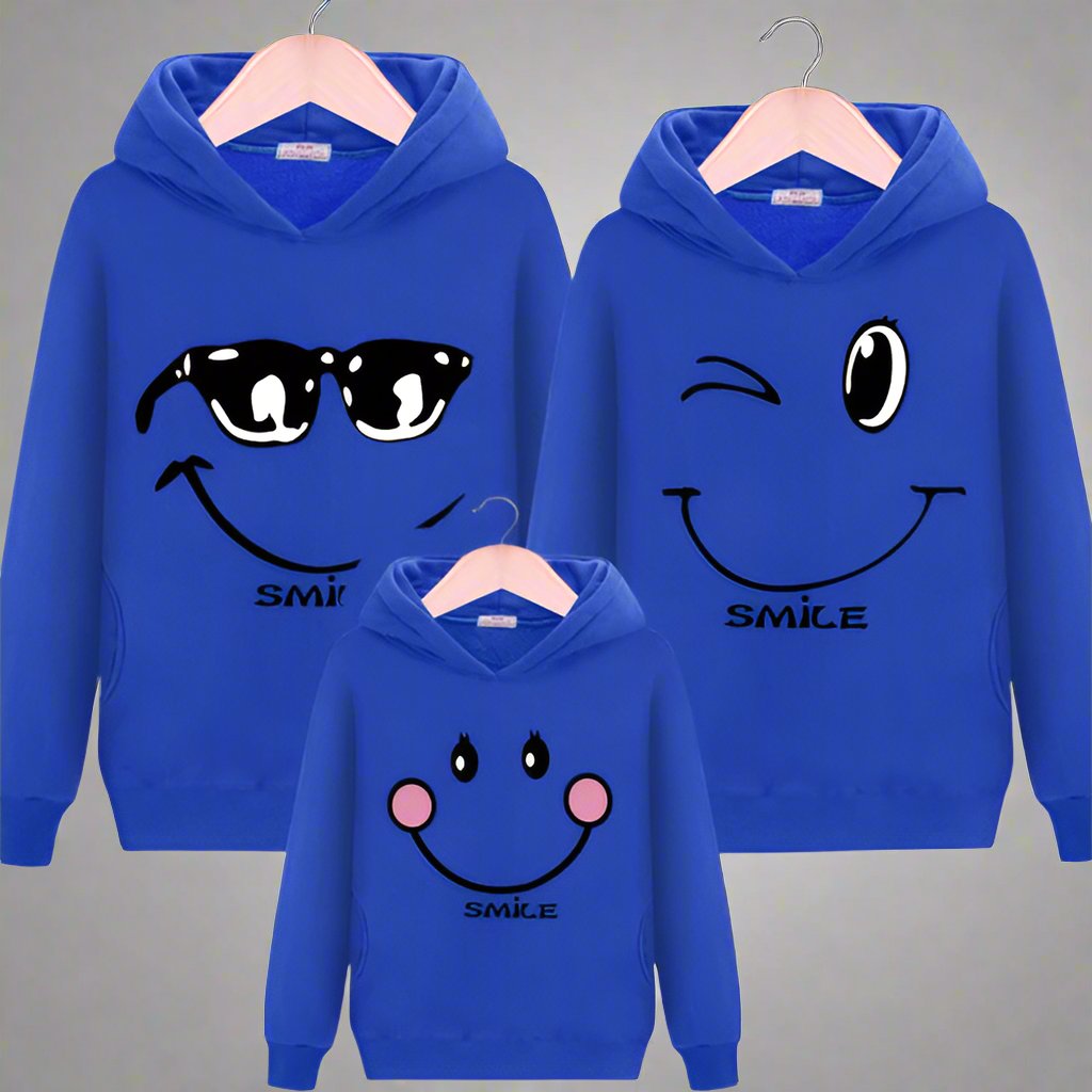 Blue family hoodie set featuring unique smiley faces with sunglasses, winking, and blushing designs